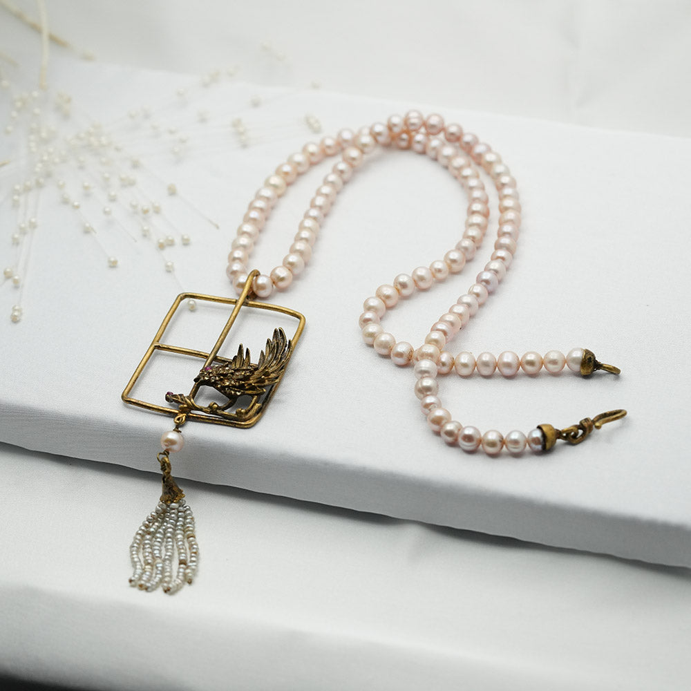 Hand Crafted Natural Pearl Matinee Bird Pendant Necklace With Tassel